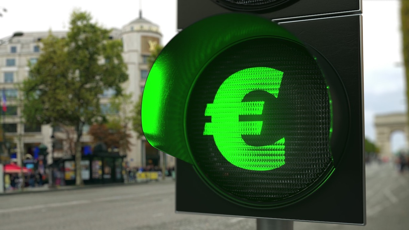 Ilustração mostra o símbolo do euro como a luz verde de um semáforo
