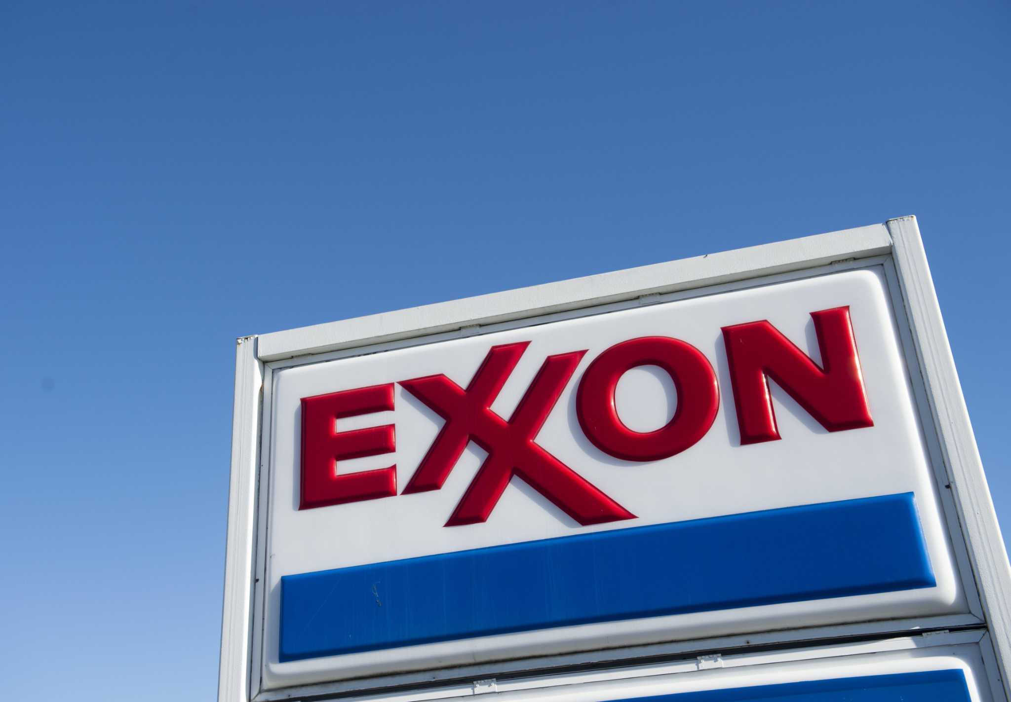 (FILES) In this file photo taken on January 5, 2016 An Exxon gas station is seen in Woodbridge, Virginia. - Exxon Mobil reported a second-quarter loss July 31, 2020, joining other petroleum giants in suffering the hit from lower oil prices due to crashing demand amid the coronavirus pandemic. (Photo by Saul LOEB / AFP) (Photo by SAUL LOEB/AFP via Getty Images) (FILES) In this file photo taken on January 5, 2016 An Exxon gas station is seen in Woodbridge, Virginia. - Exxon Mobil reported a second-quarter loss July 31, 2020, joining other petroleum giants in suffering the hit from lower oil prices due to crashing demand amid the coronavirus pandemic. (Photo by Saul LOEB / AFP) (Photo by SAUL LOEB/AFP via Getty Images)